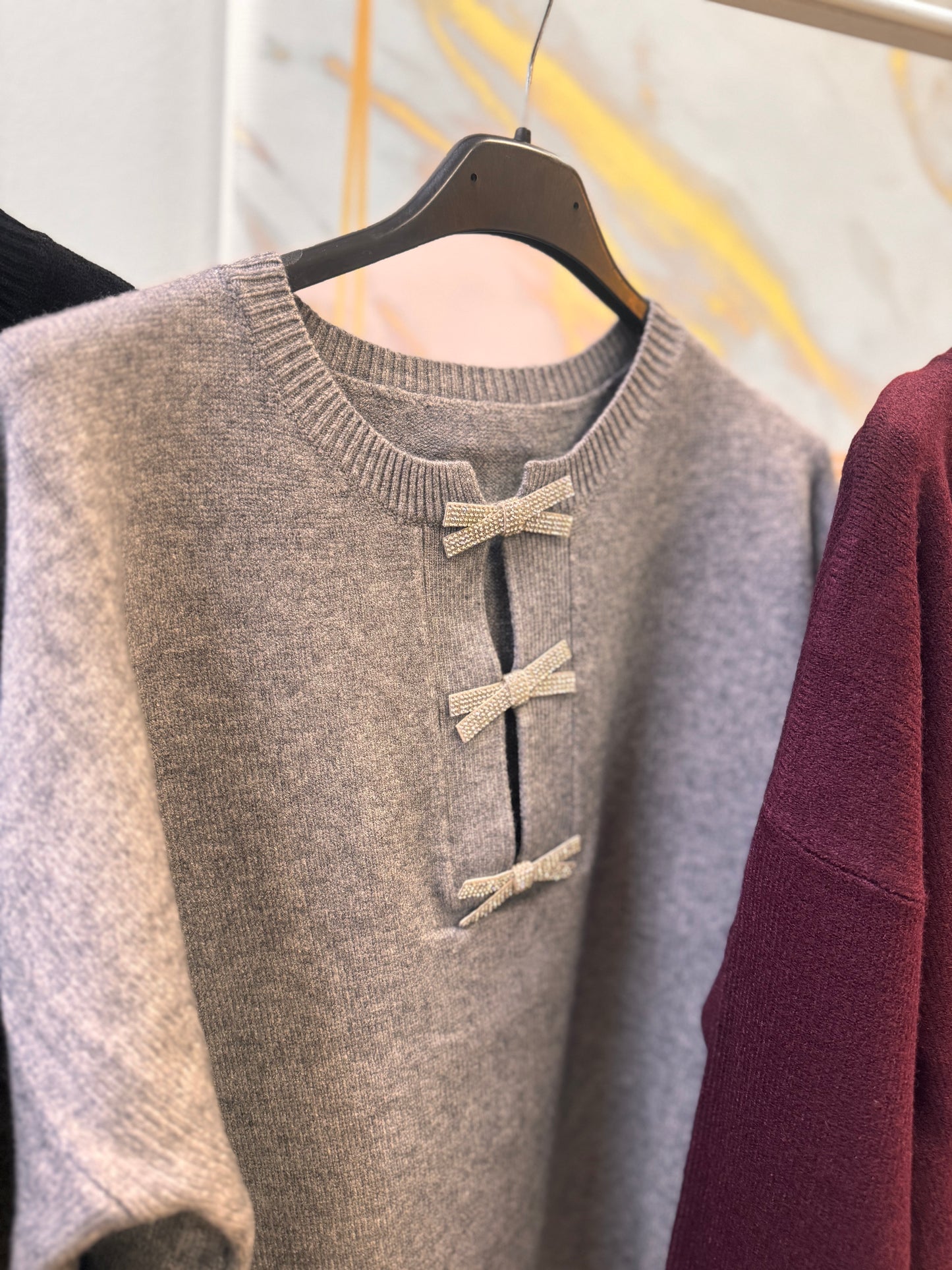 Πλεκτό με φιογκάκια