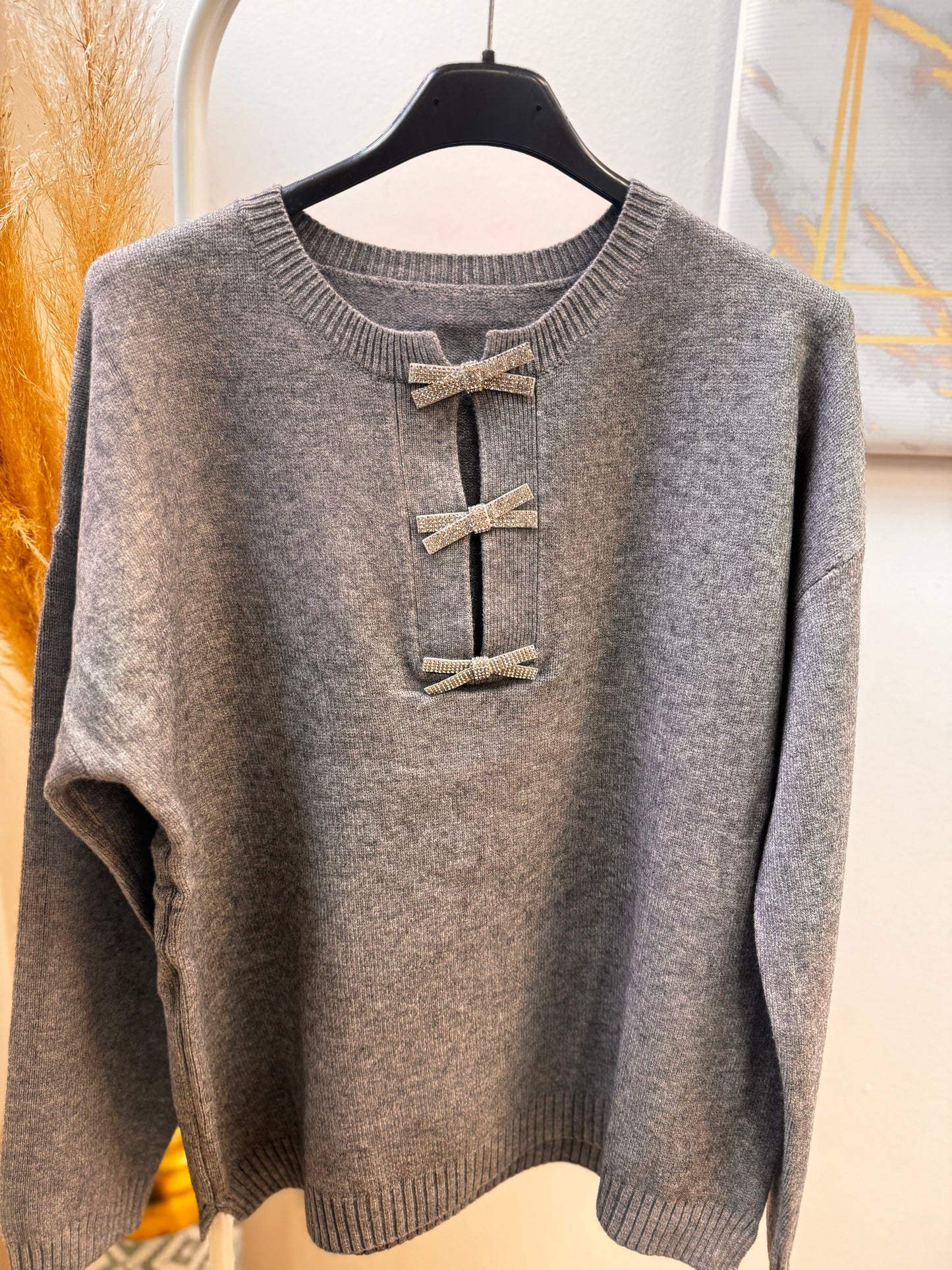 Πλεκτό με φιογκάκια